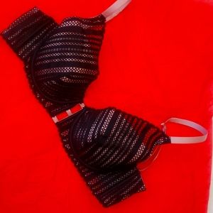 Victoria secrets bra never worn. 36C. Light pink with black from "plunge" line